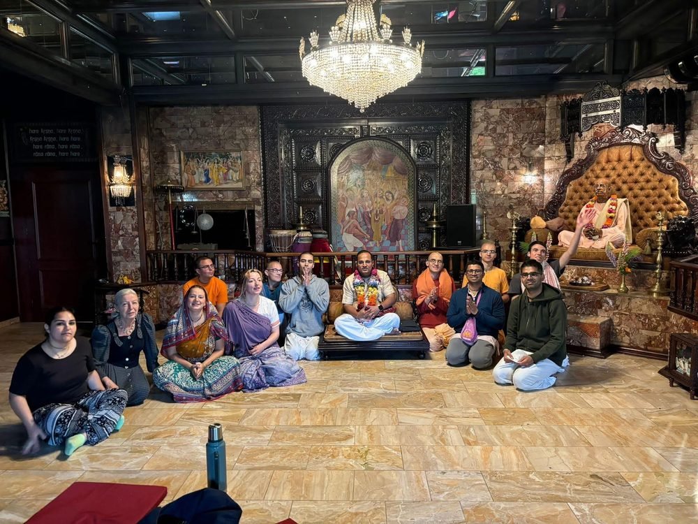 Brajsundar Das with devotees at a temple retreat program